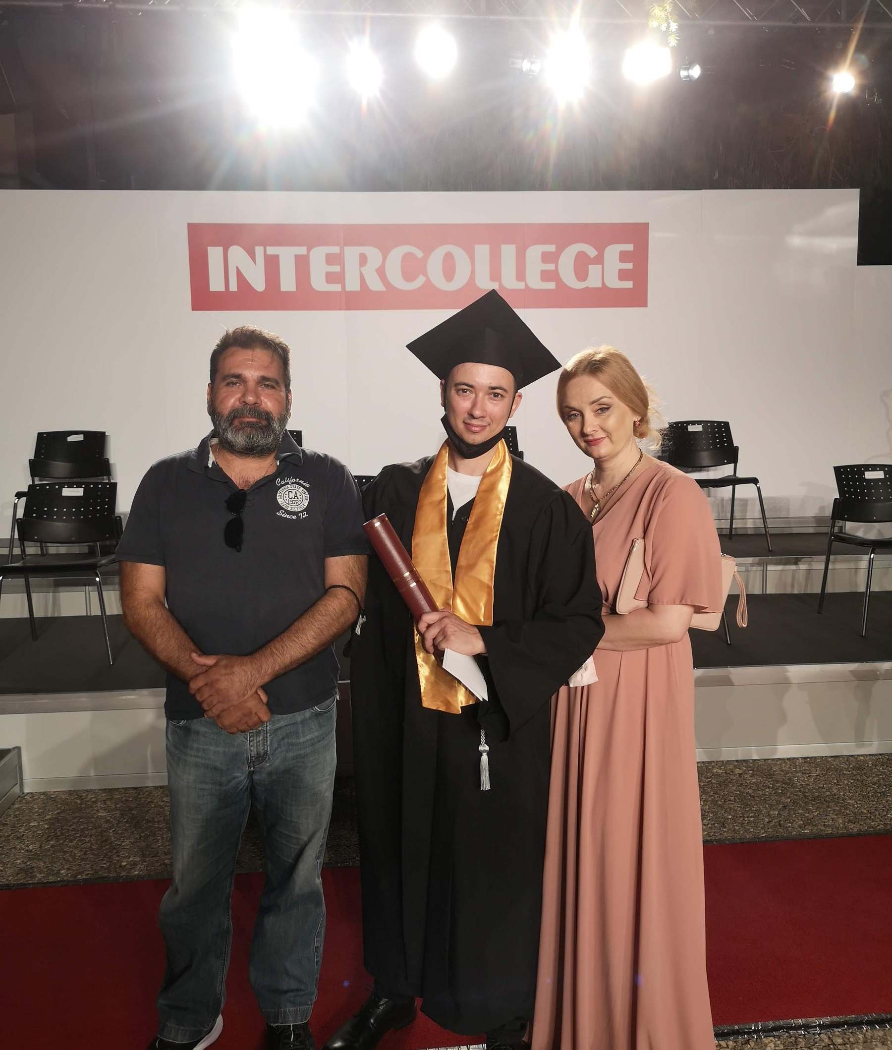 Eugene Charalampous in graduation gown at the Intercollege ceremony
