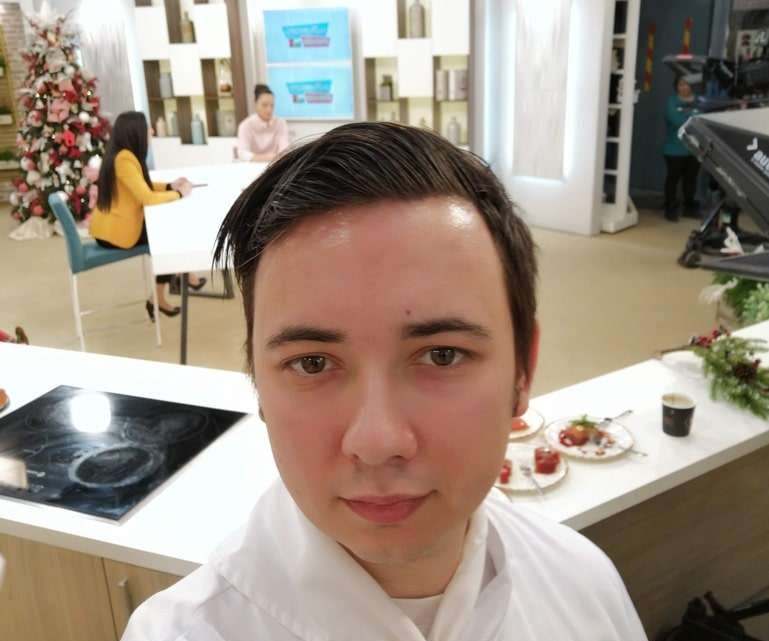 Eugene Charalampous in chef whites on a morning show set